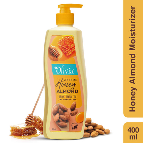 Honey almond moisturizing body lotion bottle with honeycomb and almonds beside it.